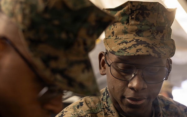 U.S. Marine Corps reservists with MWSS 472 undergo a food inspection for the Major General William Pendleton Thompson Hill Food Service Award