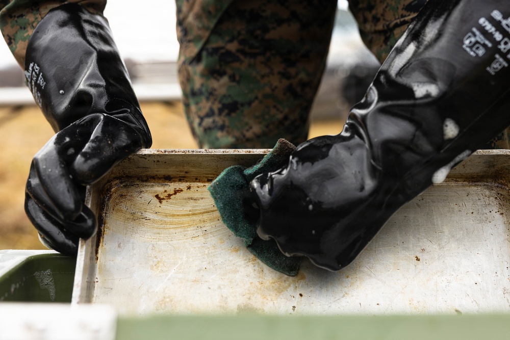 U.S. Marine Corps reservists with MWSS 472 undergo a food inspection for the Major General William Pendleton Thompson Hill Food Service Award