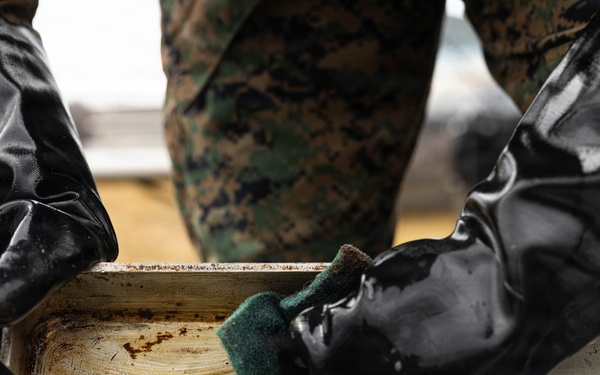 U.S. Marine Corps reservists with MWSS 472 undergo a food inspection for the Major General William Pendleton Thompson Hill Food Service Award