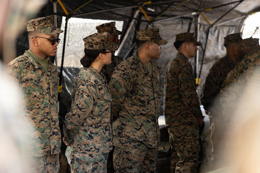 U.S. Marine Corps reservists with MWSS 472 undergo a food inspection for the Major General William Pendleton Thompson Hill Food Service Award