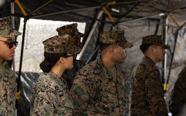 U.S. Marine Corps reservists with MWSS 472 undergo a food inspection for the Major General William Pendleton Thompson Hill Food Service Award