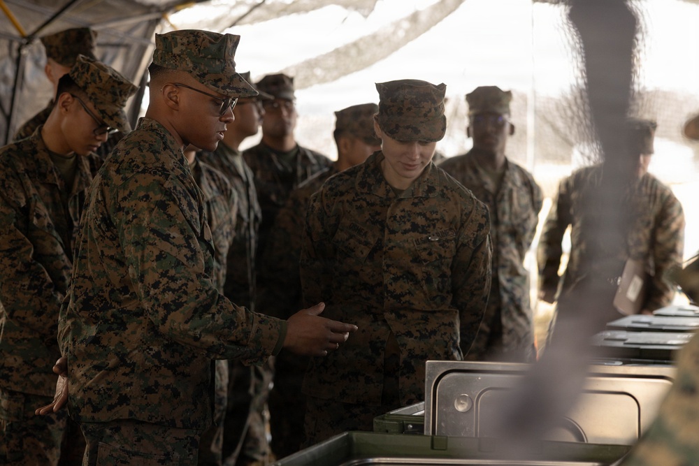 U.S. Marine Corps reservists with MWSS 472 undergo a food inspection for the Major General William Pendleton Thompson Hill Food Service Award