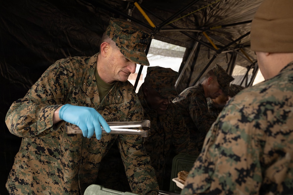 U.S. Marine Corps reservists with MWSS 472 undergo a food inspection for the Major General William Pendleton Thompson Hill Food Service Award