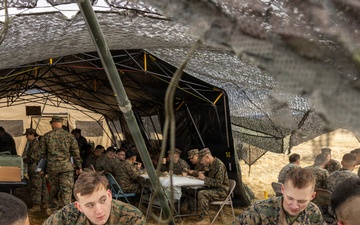 U.S. Marine Corps reservists with MWSS 472 undergo a food inspection for the Major General William Pendleton Thompson Hill Food Service Award