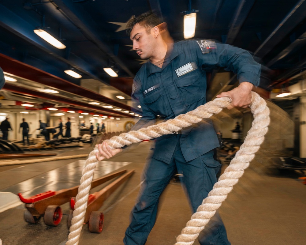 USS Theodore Roosevelt Sailor Heaves Mooring Lines