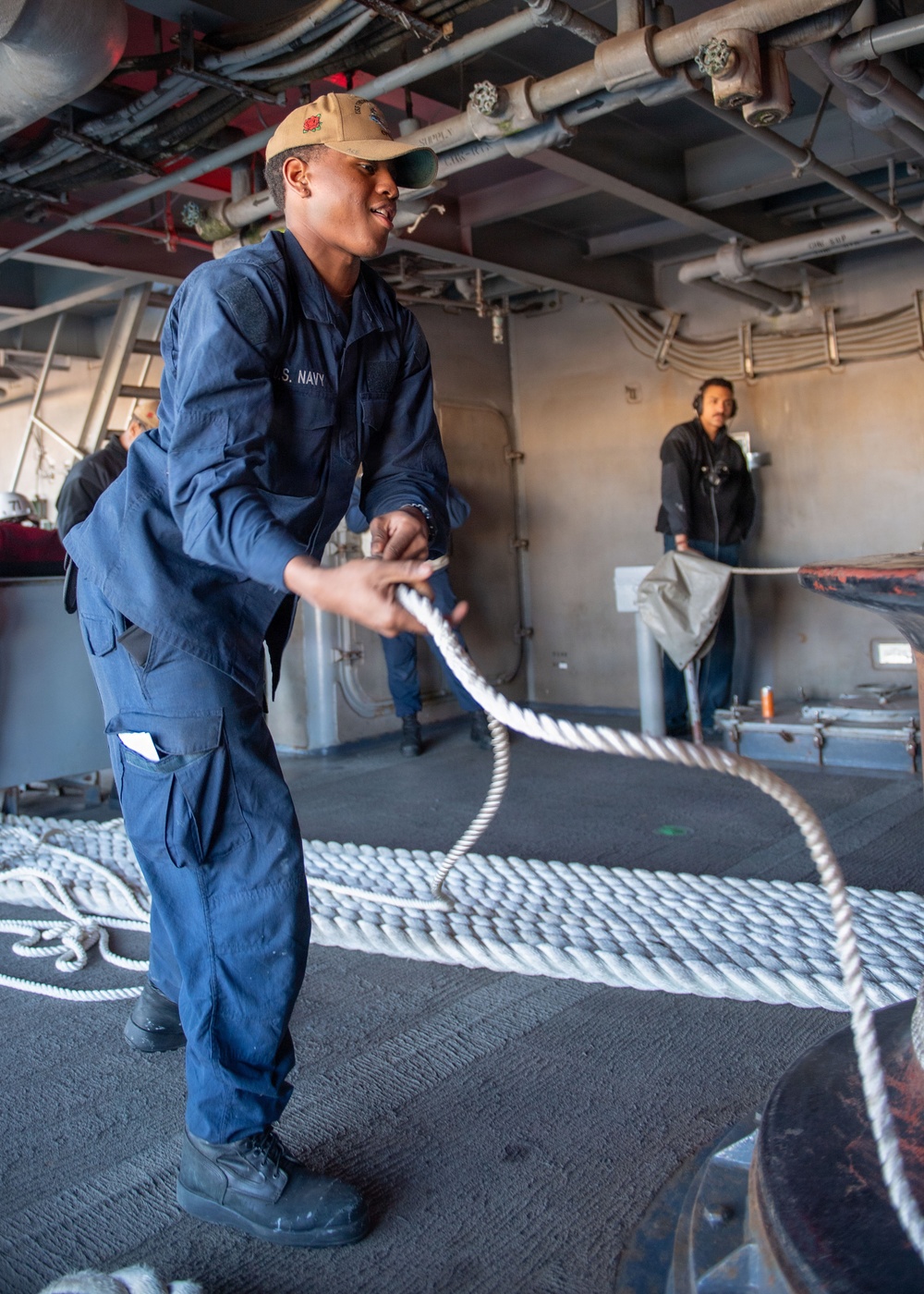 USS Theodore Roosevelt Sailor Heaves Mooring Lines