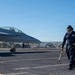 USS Theodore Roosevelt Sailor Cleans Padeyes
