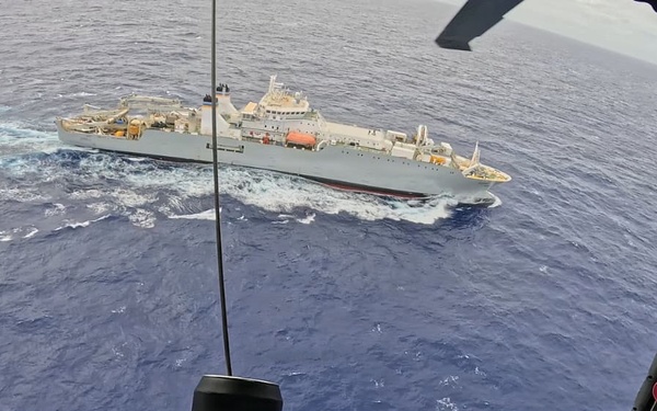 U.S. Navy Helicopter Sea Combat Squadron 25 approaches vessel off Guam for medevac