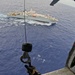 U.S. Navy Helicopter Sea Combat Squadron 25 approaches vessel off Guam for medevac