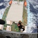 U.S. Navy Helicopter Sea Combat Squadron 25 hoists ill mariner from vessel off Guam