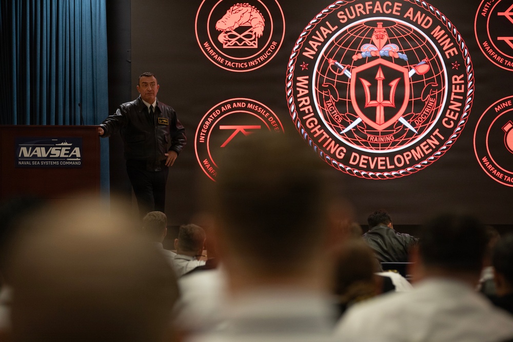Rear Adm. Joe Cahill speaks during WTI Re-Blue