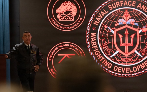 Rear Adm. Joe Cahill speaks during WTI Re-Blue