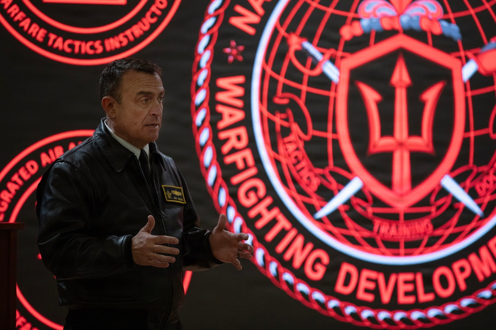 Rear Adm. Joe Cahill speaks during WTI Re-Blue