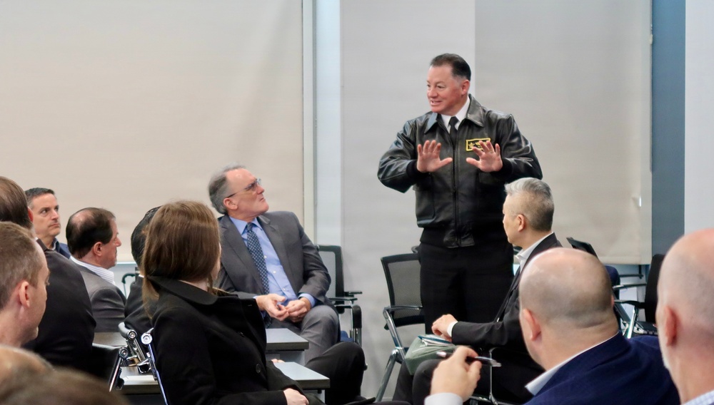 Rear Adm. T. J. Zerr speaks during WTI Re-Blue