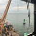 U.S. Army, Coast Guard recover, relocate beached buoy on Cumberland Island