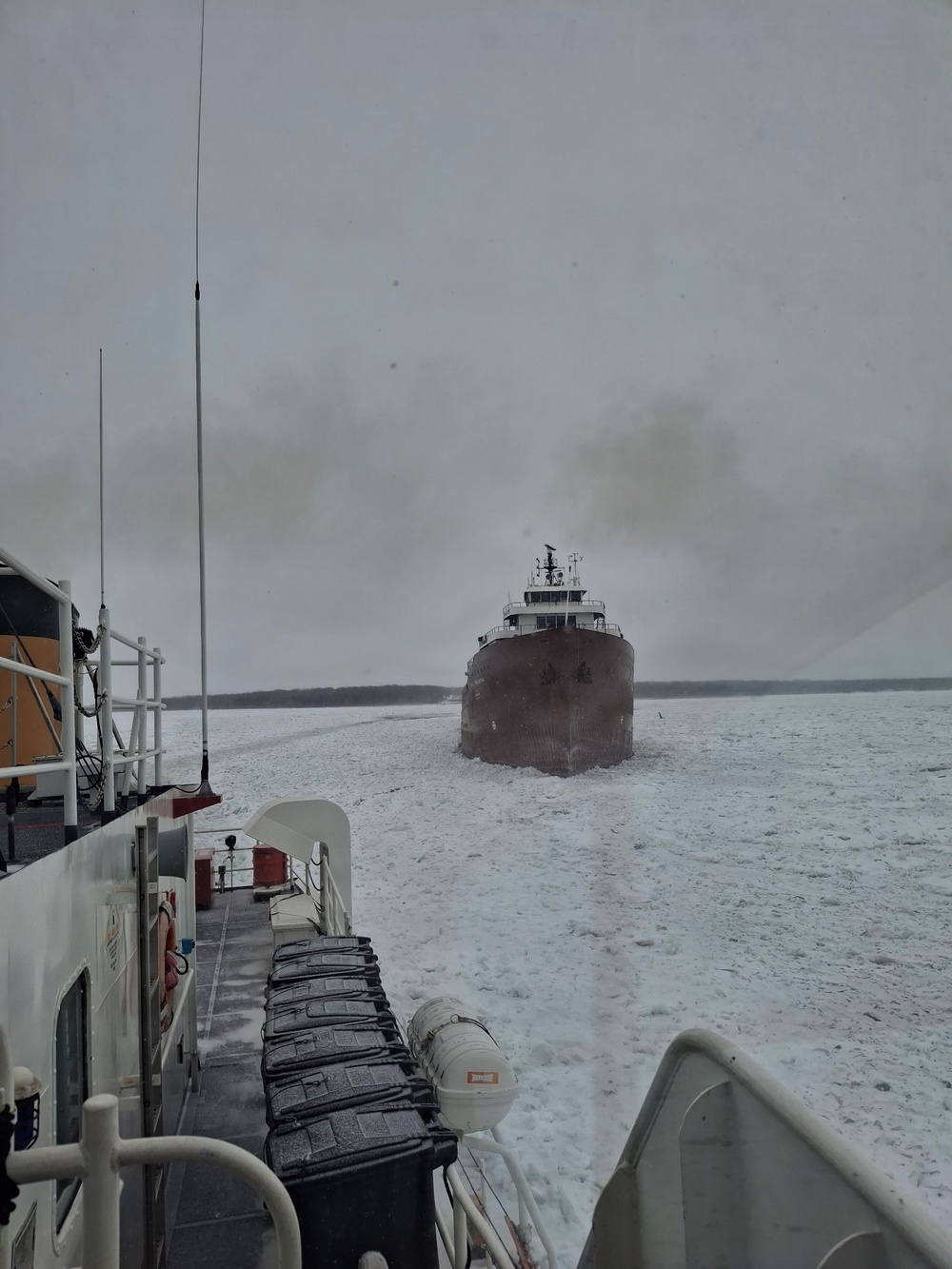 Coast Guard Cutter Neah Bay (WTGB 105) assists motor vessel Lee A. Tregurtha through St. Marys River, Michigan