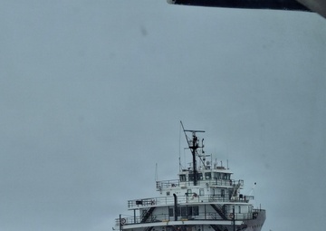 Coast Guard Cutter Neah Bay (WTGB 105) assists motor vessel Lee A. Tregurtha through St. Marys River, Michigan