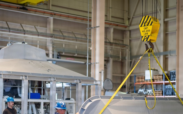 Mission Package Support Facility Team Prepares Gun Mission Module for Shipment to Florida