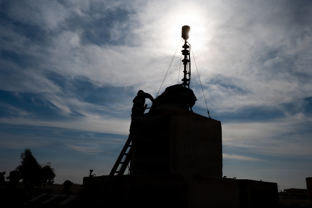 379th Expeditionary Civil Engineering Squadron move a sensor