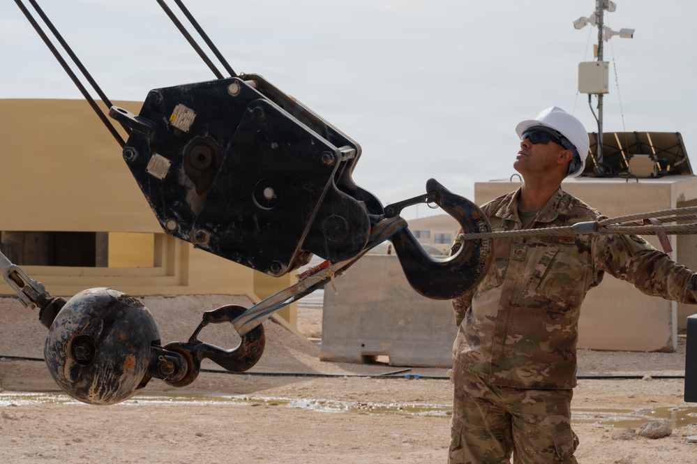 379th Expeditionary Civil Engineering Squadron move a sensor