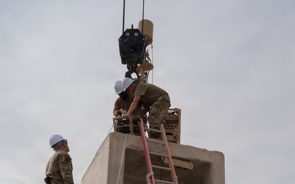 379th Expeditionary Civil Engineering Squadron move a sensor