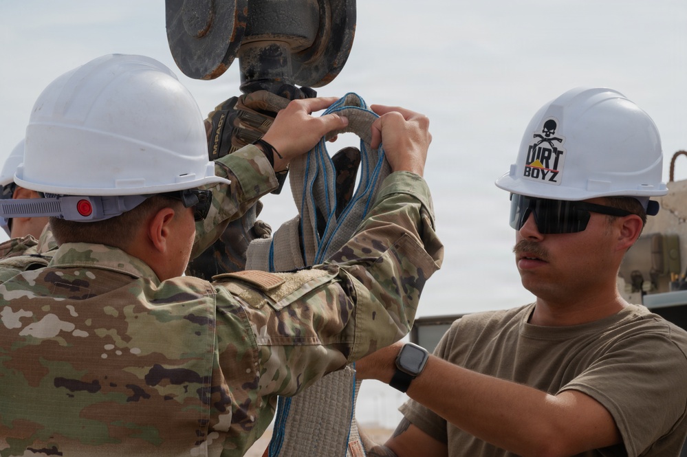 379th Expeditionary Civil Engineering Squadron move a sensor