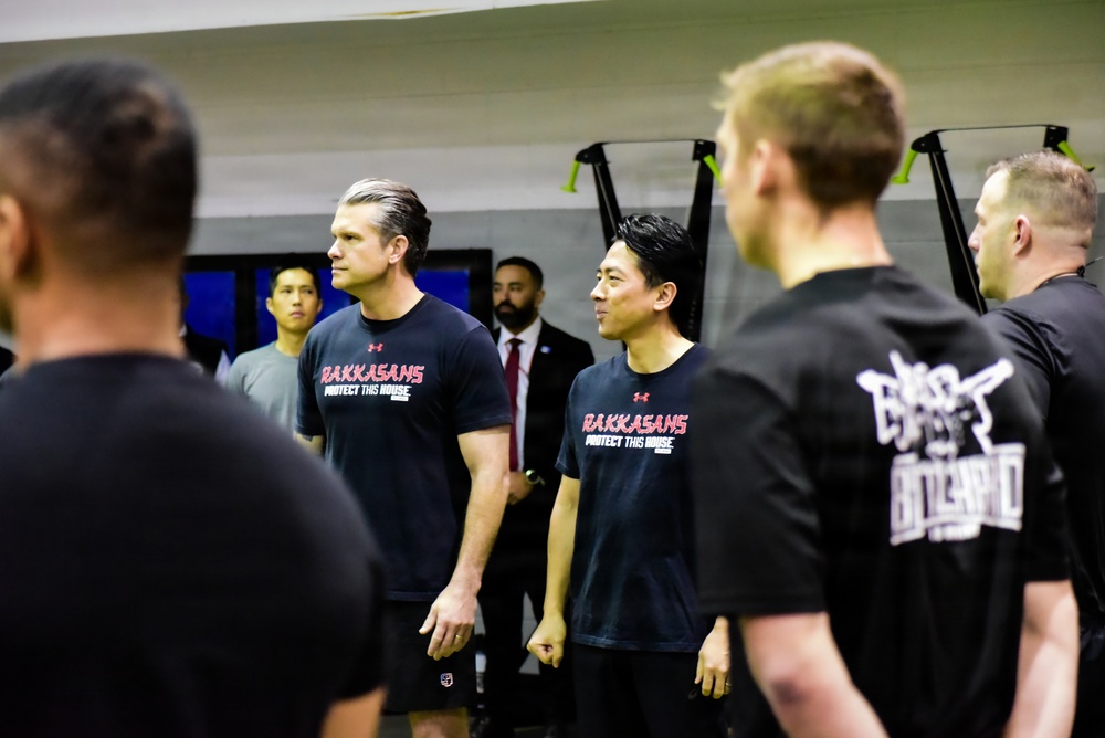 Secretary Of War Participates in Troop PT