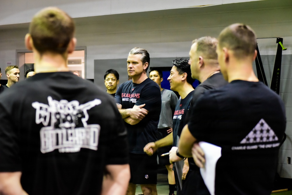 Secretary Of War Participates in Troop PT