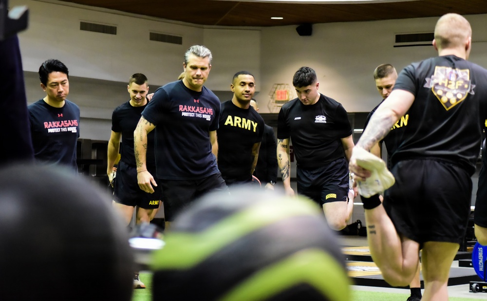 Secretary Of War Participates in Troop PT