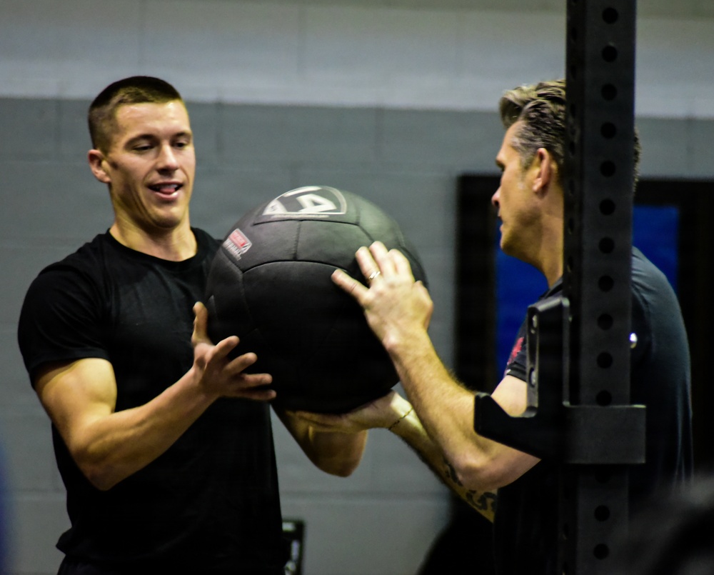 Secretary Of War Participates in Troop PT