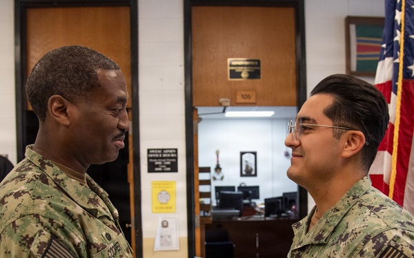 Engineman 1st Class Camacho receives Navy and Marine Corps Achievement Medal at end of SWESC tour