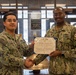 Engineman 1st Class Camacho receives Navy and Marine Corps Achievement Medal at end of SWESC tour
