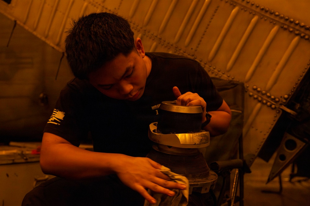 Abraham Lincoln conducts routine aircraft maintenance