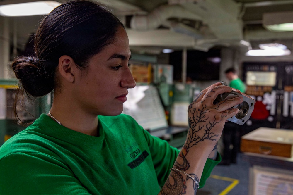 Abraham Lincoln conducts routine aircraft maintenance