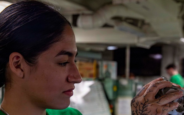 Abraham Lincoln conducts routine aircraft maintenance