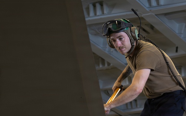 Abraham Lincoln conducts routine aircraft maintenance