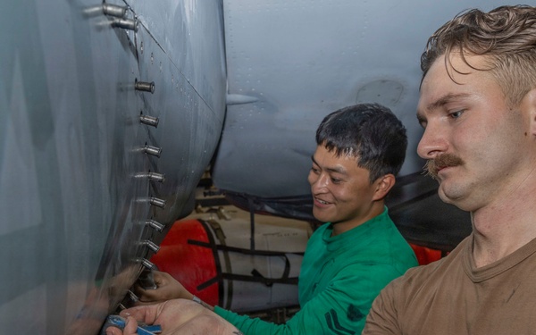 Abraham Lincoln conducts routine aircraft maintenance