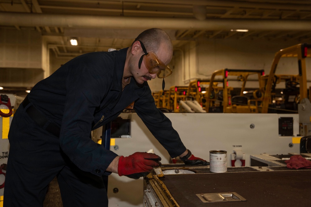 Abraham Lincoln conducts routine maintenace