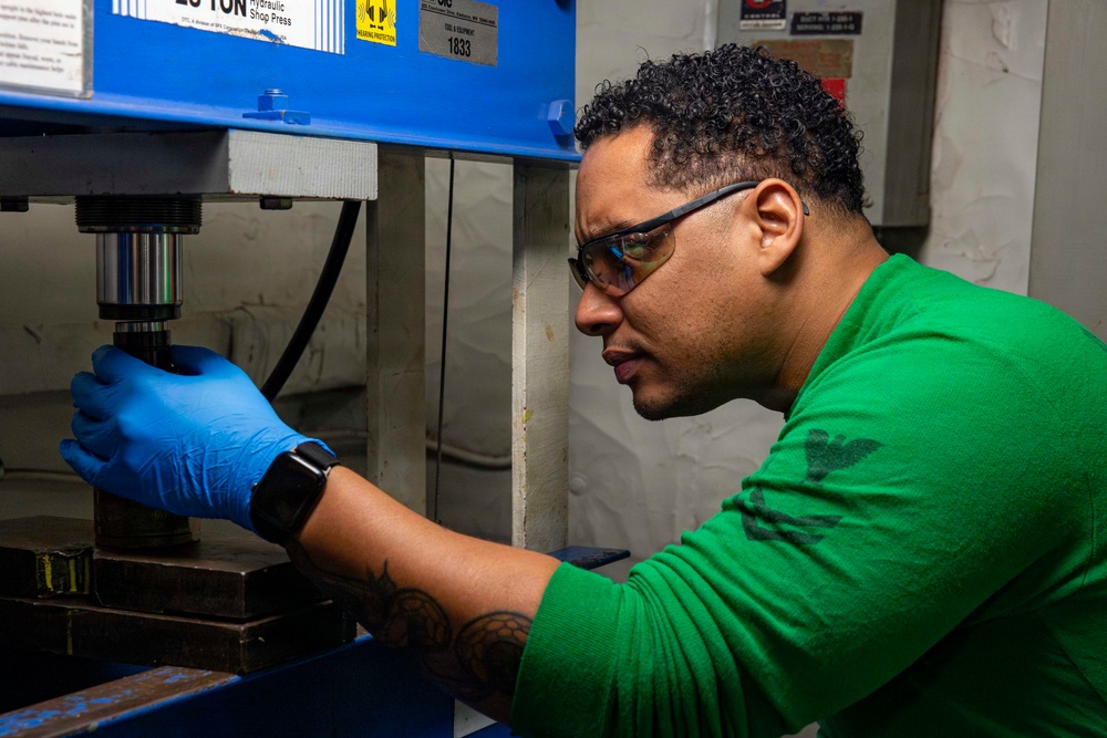 Abraham Lincoln conducts routine aircraft maintenance