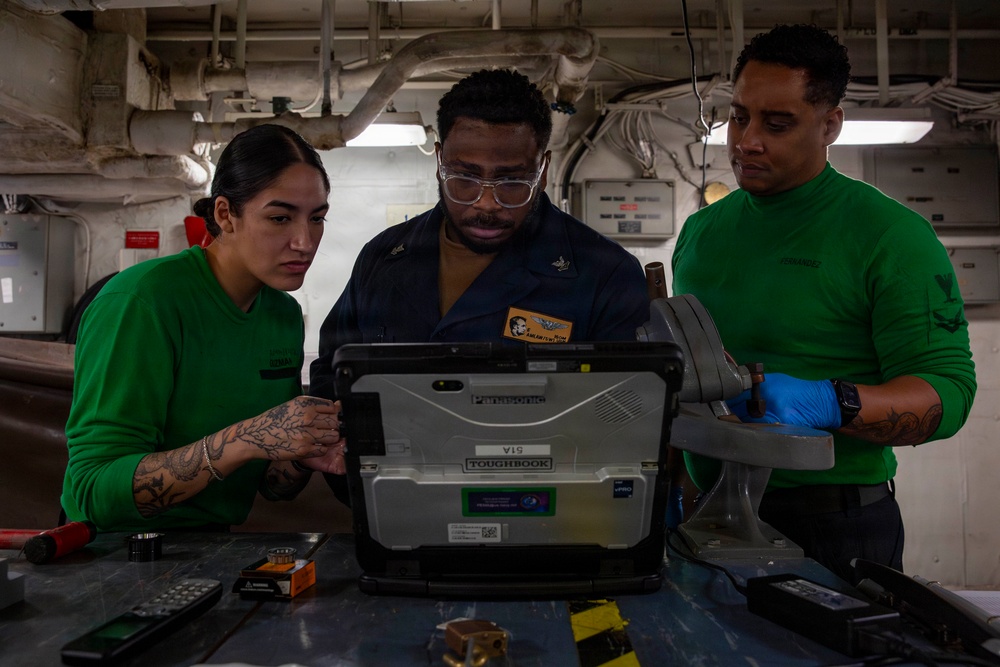 Abraham Lincoln conducts routine aircraft maintenance