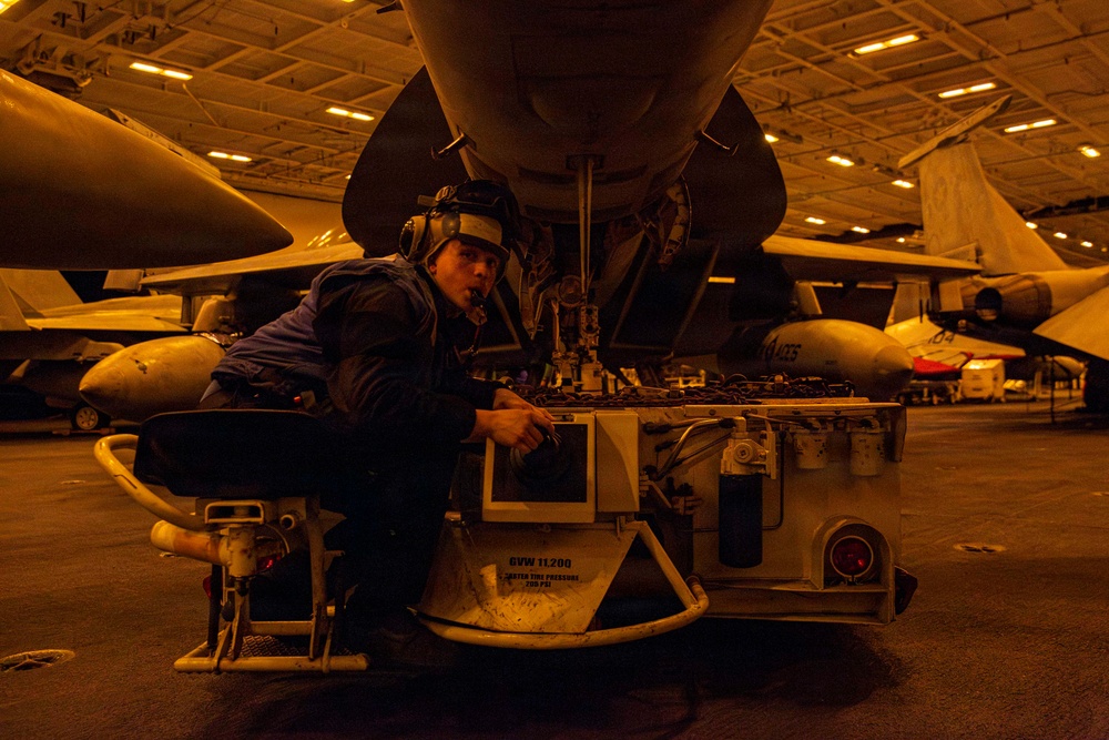 Abraham Lincoln conducts routine aircraft maintenance