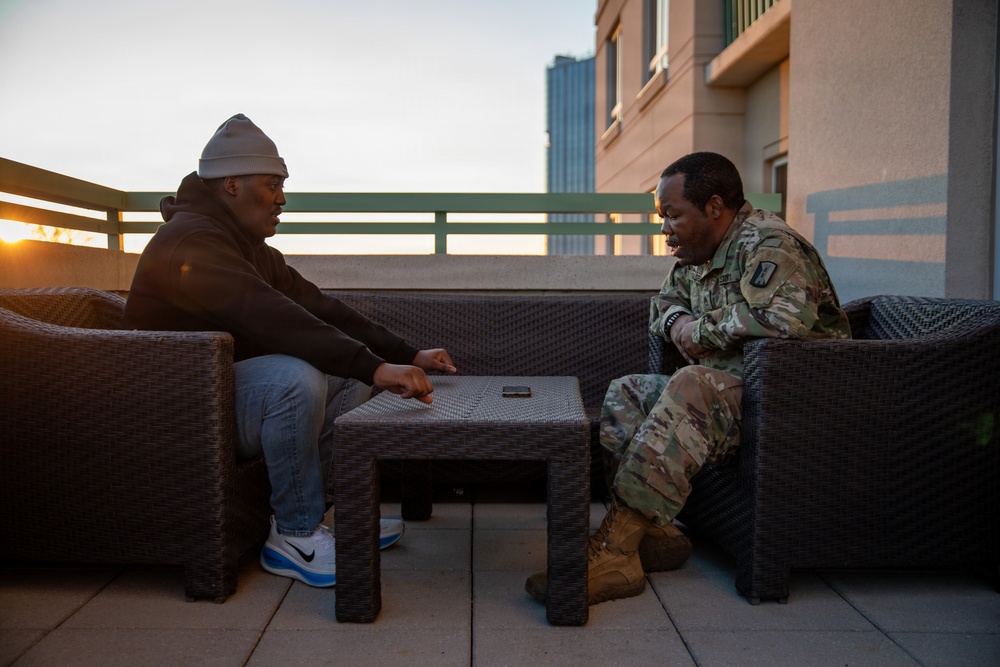 Mississippi Army National Guard Soldiers participate in a father-son interview