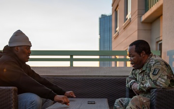 Mississippi Army National Guard Soldiers participate in a father-son interview
