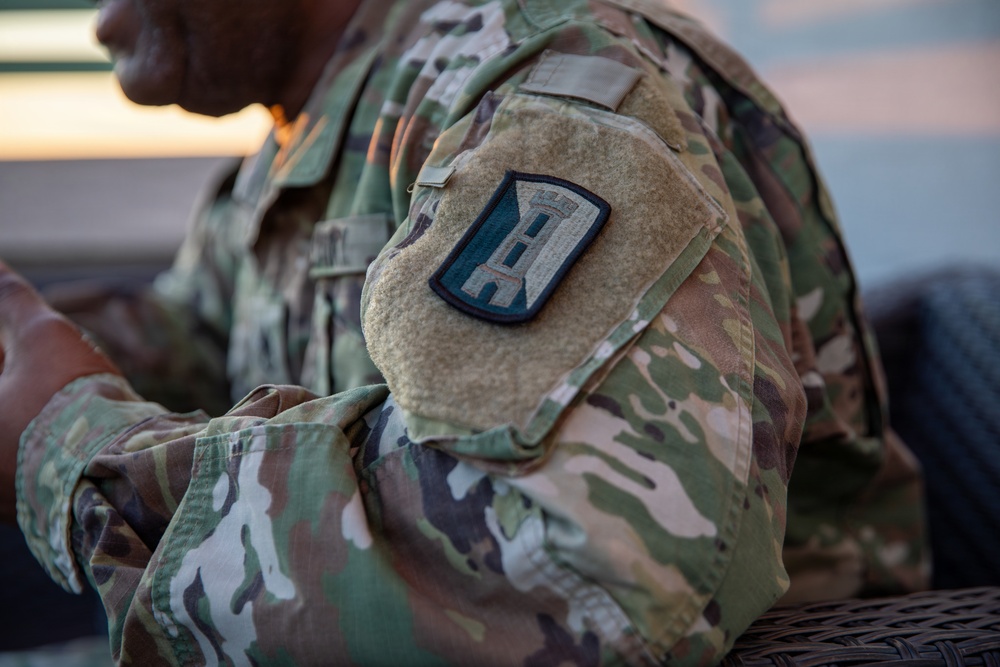 A Mississippi Army National Guard Soldier participates in a father-son interview