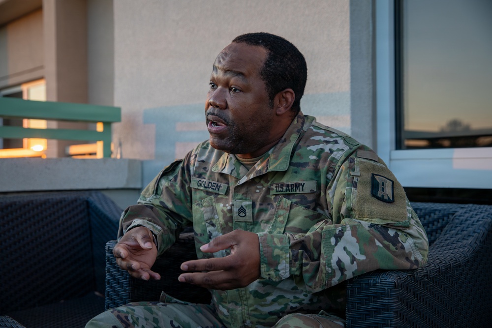 A Mississippi Army National Guard Soldier participates in a father-son interview
