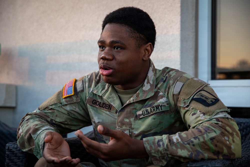A Mississippi Army National Guard Soldier participates in a father-son interview