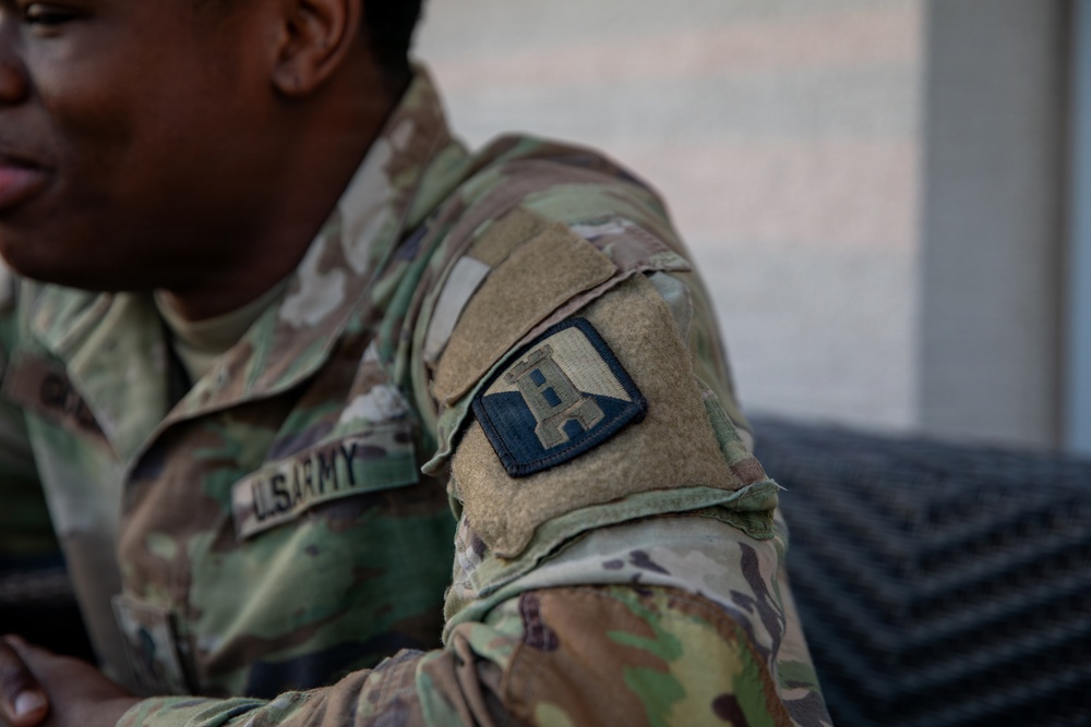 A Mississippi Army National Guard Soldier participates in a father-son interview