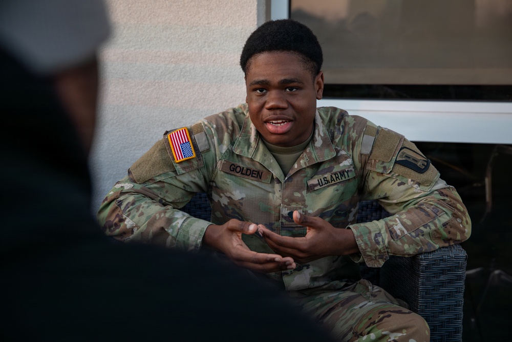 A Mississippi Army National Guard Soldier participates in a father-son interview
