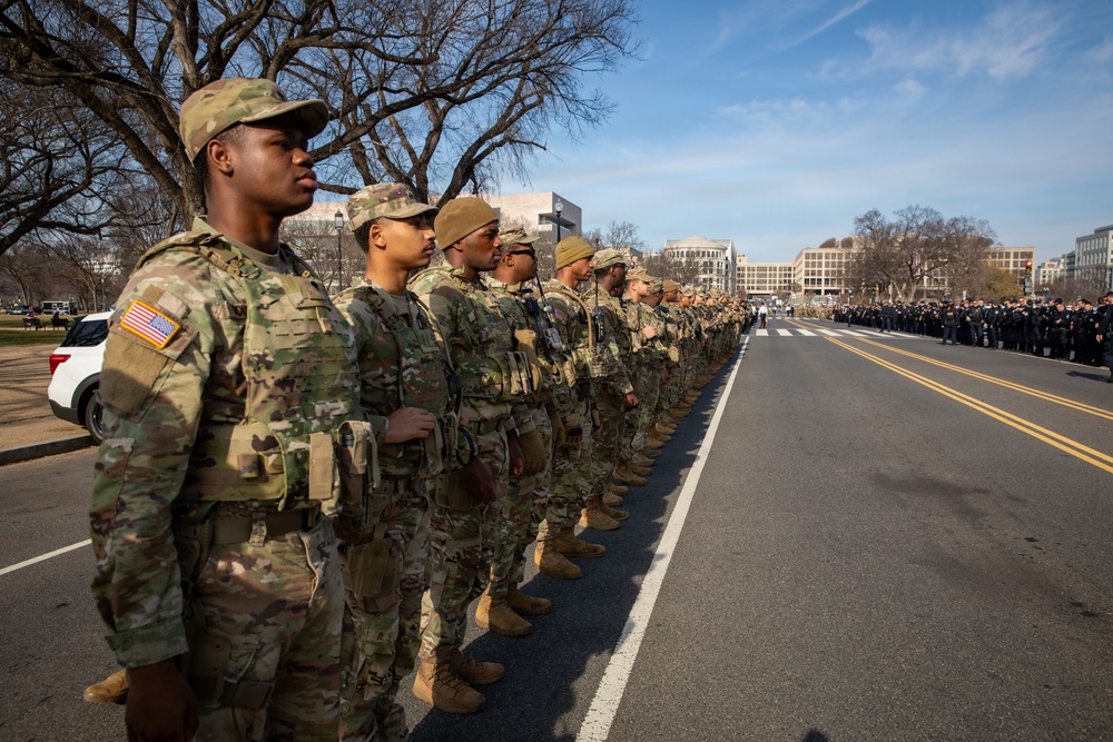Mississippi National Guard service members join a dignified escort for fallen Metropolitan Police Department Officer