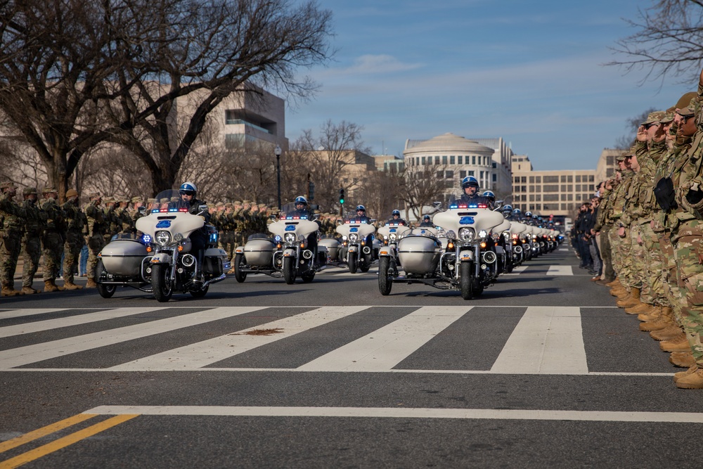 Mississippi National Guard service members join a dignified escort for fallen Metropolitan Police Department Officer
